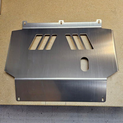 Angled slot skidplate